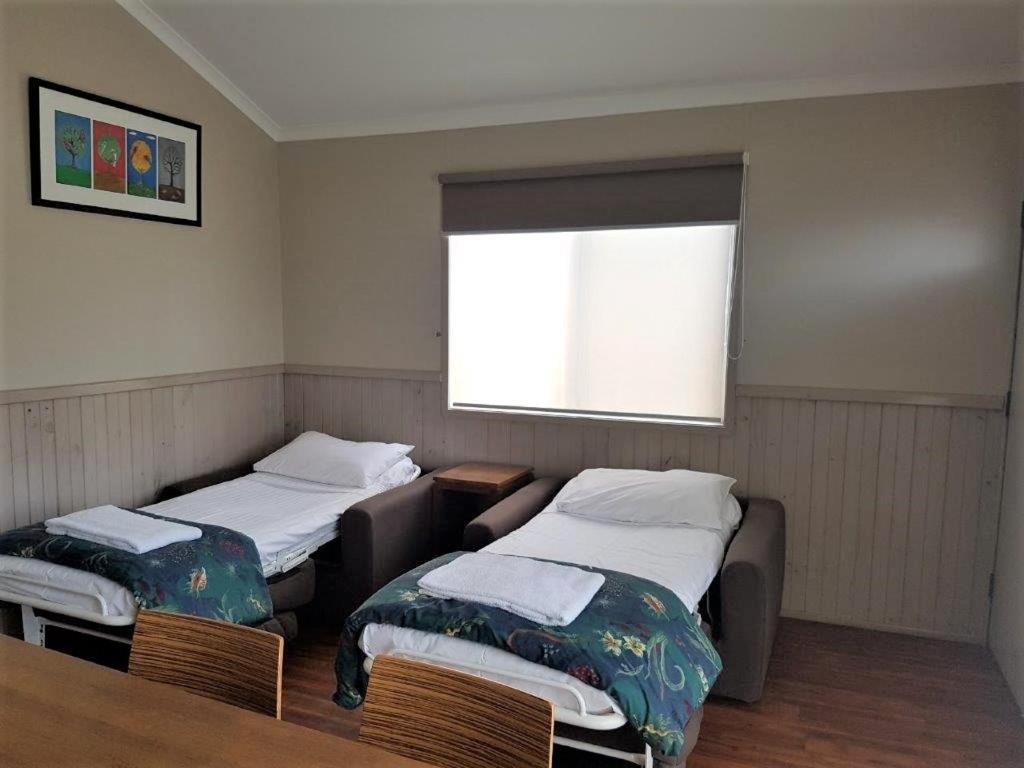 Canberra Carotel Motel Habitación foto